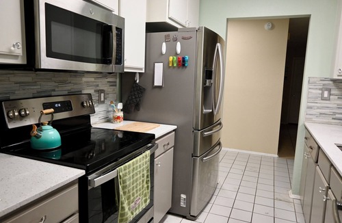 Live Oak House | Spacious 3BR Furnished Home: Bar, Sunroom & Bonus Rooms