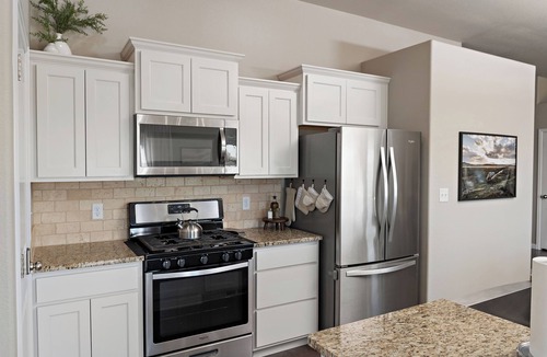 Pueblo West House | Spacious 3BR Home Sleeps 10 with Firepit & Game Rm