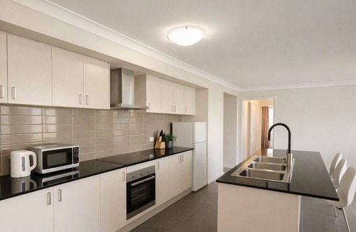 Caboolture South House | Spacious 4-Bedroom Home in Caboolture with Parking