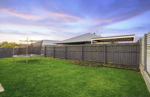 Caboolture South House | Spacious 4-Bedroom Home in Caboolture with Parking