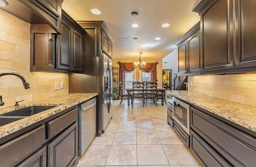 South Oklahoma City House | Spacious 4-bedroom House with a Pool, Hot Tub and a Large Backyard