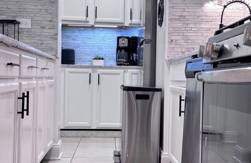 East Harlem Apartment | Spacious 4-bedroom apartment by Central Park North with fire place and gym