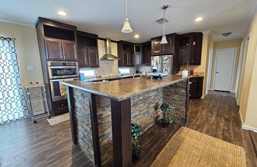 Bellville House | Spacious 4-bedroom Foremans ranch house on a 150 acre ranch with a deck/full gym