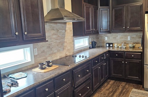 Bellville House | Spacious 4-bedroom Foremans ranch house on a 150 acre ranch with a deck/full gym