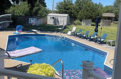 Wichita House | Spacious 4-bedroom house with Private Heated Pool, Outdoor Firepit and TV Oasis