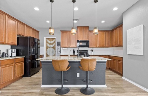Hutto House | Spacious 4-bedroom Round Rock home with an open floor plan, Smart TVs in every room, and high-speed internet. Pet-friendly and conveniently close to Kalahari Resort and Dell Diamond, this modern yet cozy retreat is perfect for families & long stays.