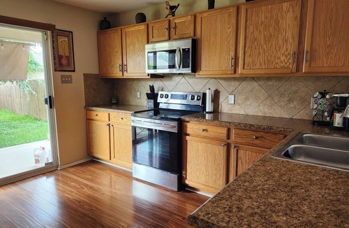 Pflugerville House | Spacious 4-bedroom house with WiFi, AC and Heat, in welcoming Pflugerville.