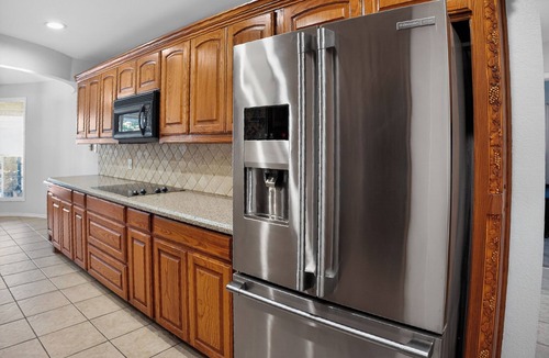North Richland Hills House | Spacious 4BR w/2 King Beds, Media Room + Large Parking