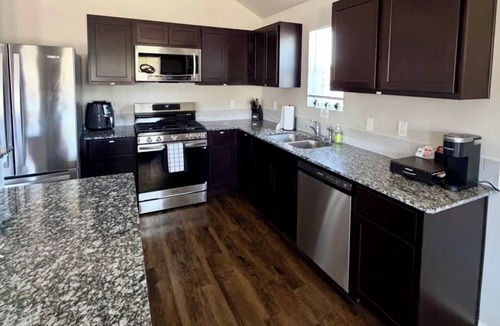 Noble House | Spacious 4BR/2Bath Near OU & OKC with Patio, Fire Pit & Perfect for Gatherings