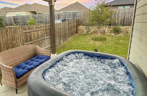 Buda House | Spacious 4BR Escape with Hot Tub, Laundry, and Pools in Buda.