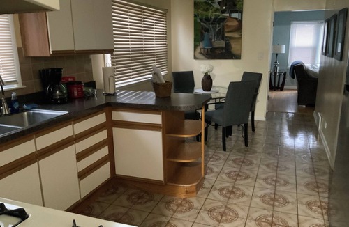 Chicago House | Spacious 4BR Near O’Hare & Rosemont Sleeps 8/2 Kitchens/ Free Parking