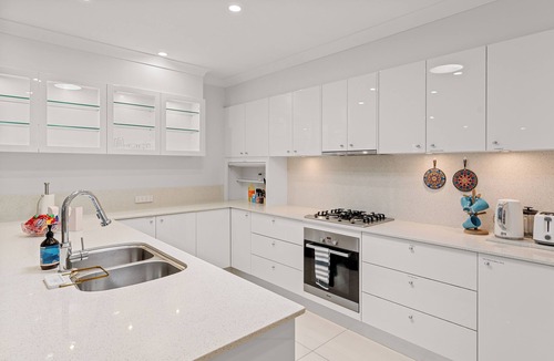 Burleigh Waters House | Spacious 4BR Poolside Escape