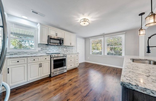 Huddleston House | Spacious 4BR with private boat dock and lakefront access