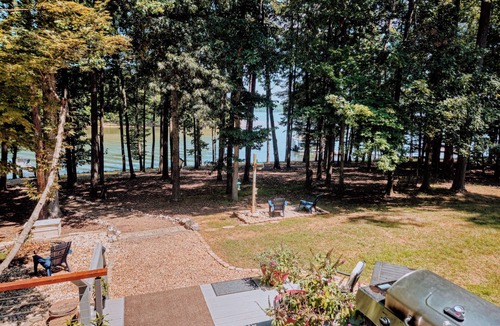 Merifield Acres House | Spacious 4BR wooded lakefront house, with dock, multiple decks & ample parking.
