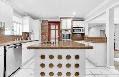 El Portal House | Spacious 5-bedroom, 2-bath home in picturesque El Portal, complete with AC