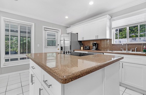 El Portal House | Spacious 5-bedroom, 2-bath home in picturesque El Portal, complete with AC