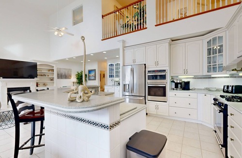 Heron Harbour Isle House | Spacious 5 bedroom, waterfront home w/grill, firepit, full kitchen & shared pool