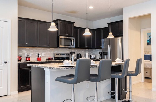 Four Corners House | Spacious 5BR Oasis at Windsor at Westside – BBQ, Pool – Perfect for Families!