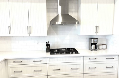 Southeast Calgary House | Spacious 5BR Retreat w/Hot Tub, Fire Pit, Gym & Movie Room