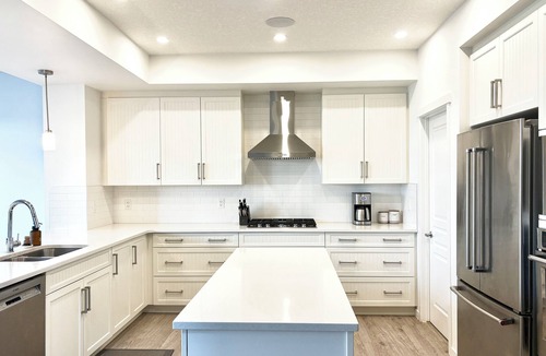 Southeast Calgary House | Spacious 5BR Retreat w/Hot Tub, Fire Pit, Gym & Movie Room