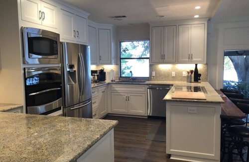 Kingsland House | Spacious 6BR Corner Lot Lakefront Home - Boat Lift & Jet Ski Ramp - Double Deck