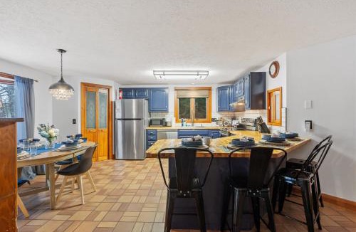 Orange House | Spacious Accessible Waterfront Retreat with Hot Tub