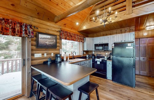 Presque Isle House | Spacious and beautiful lakefront log home on 7 acres with private dock