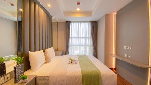 Kebayoran Lama Apartment | Spacious and Homey 2BR Apartment with Private Lift at The Kencana Residence By Travelio