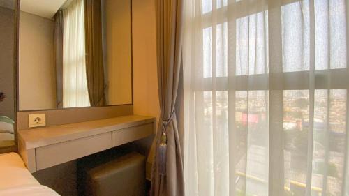 Kebayoran Lama Apartment | Spacious and Homey 2BR Apartment with Private Lift at The Kencana Residence By Travelio