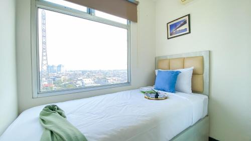 Pluit Apartment | Spacious and Homey 3BR at Green Bay Pluit Apartment By Travelio