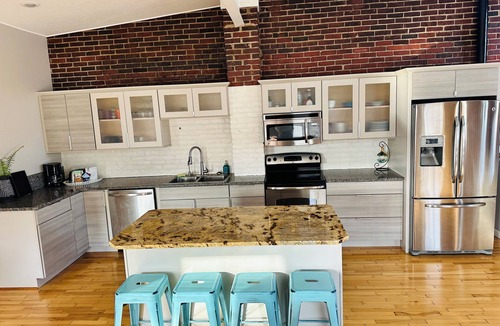 Logansport House | Spacious and luxurious downtown loft in Logansport w/incredible rooftop patio