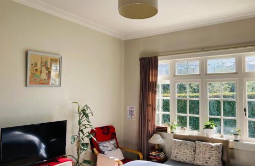 Mount Albert House | Spacious and Sunny Master Bedroom with shared bathrooms