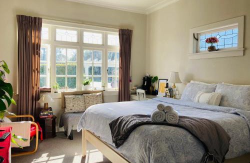 Mount Albert House | Spacious and Sunny Master Bedroom with shared bathrooms