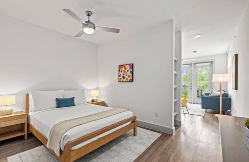 Waller Creek District Hotel | Spacious Apartment for Long-Term Comfort in Downtown Austin | Kitchen & Pool
