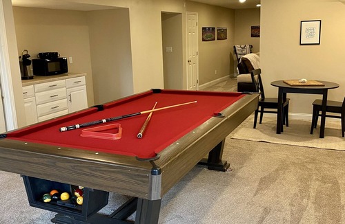 New Century Apartment | Spacious basement apartment near Scheels Soccer park with pool table
