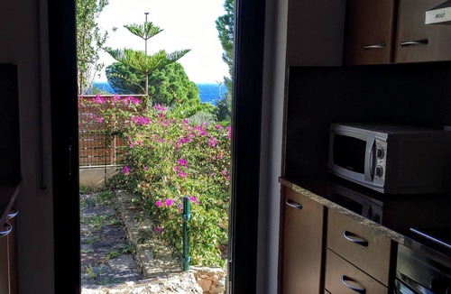Llanca Apartment | Spacious, bright, terrace and sea view garden, near beaches and harbor, air conditioning/wf