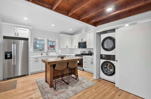 Millville Cabin | Spacious cabin w/private river, hot tub & fire pit
