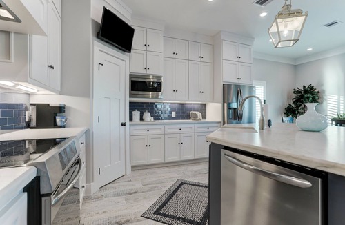 Isla Del Sol House | Spacious Canal Home w/Boat Slip, Elevator & Golf Cart