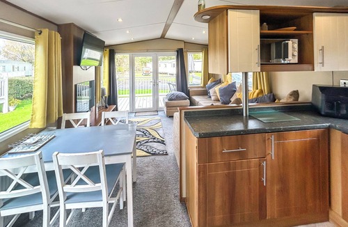 Burnham-on-Sea Apartment | Spacious caravan sleeps six, with private decking and master ensuite.