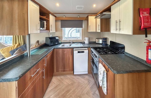 Burnham-on-Sea Apartment | Spacious caravan sleeps six, with private decking and master ensuite.