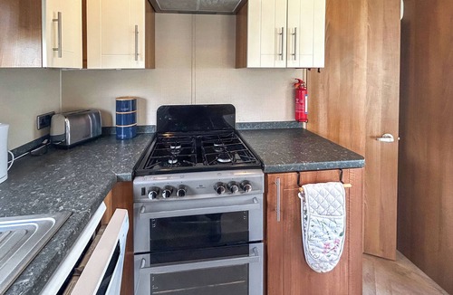 Burnham-on-Sea Apartment | Spacious caravan sleeps six, with private decking and master ensuite.