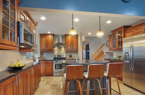 Carol Stream House | Spacious Chicagoland Retreat w/Hot Tub + Fireplace Sleeps 6+