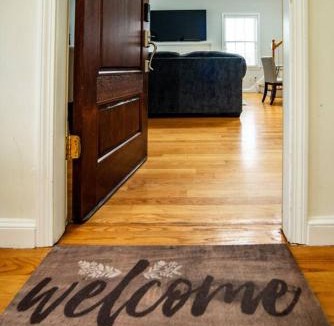 Swampscott Apartment | Spacious Coastal Townhome Deck and Parking