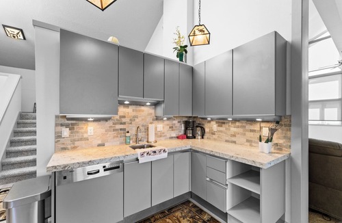 Lakeside Village Condo | Spacious Condo Overlooking Keystone Lake w/2 Private Balconies & Fireplaces!