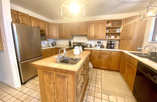 Jocelyn Cottage | Spacious Cottage On Lake with Beach, Fire Pit, Kayaks, Pedal Boat & More!