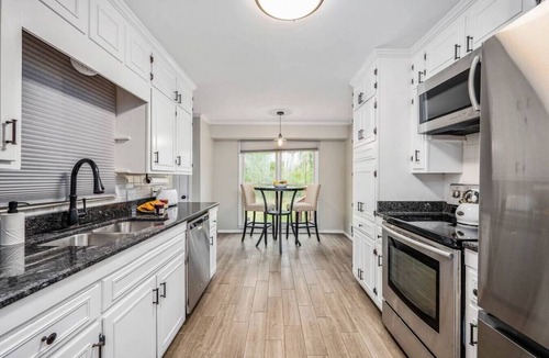 Macon House | Spacious Family Home | Sleeps 8 · Garage