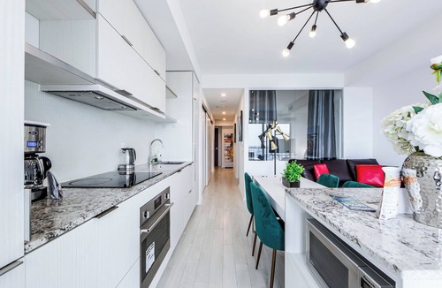 Bay Cloverhill Condo | Spacious Furnished Apartment Sleeps 4 With Walkout Balcony, Parking Available