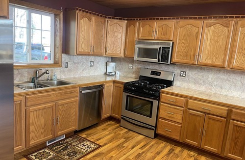 Manistee House | Spacious getaway nestled between two beautiful lakes!