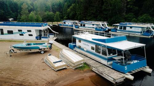Babbitt House | Spacious Getaway Series Cabin-Style Boat with Water Slide Near Babbitt, MN
