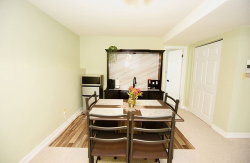 Bayridge West House | Spacious Hearth Escape with Natural Light & fireplace